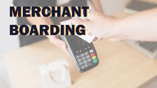 Merchant Boarding: a hand holding a bank card to a portable card reader