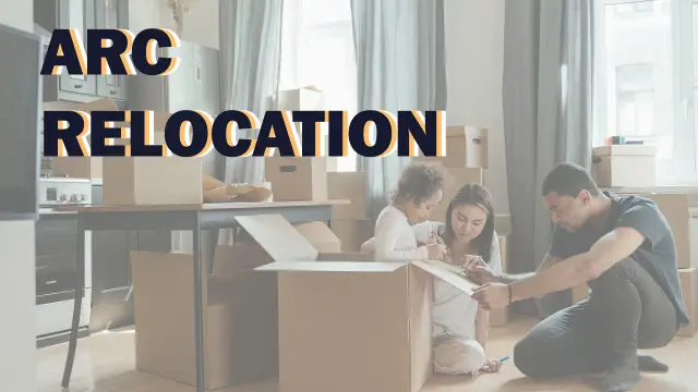 ARC Relocation: a family unpacking cardboard boxes in an empty room